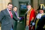 James Heappey MP, Joe Garner Nationwide's CEO and Jon Cousins, Mayor of Glastonbury cutting the ribbon
