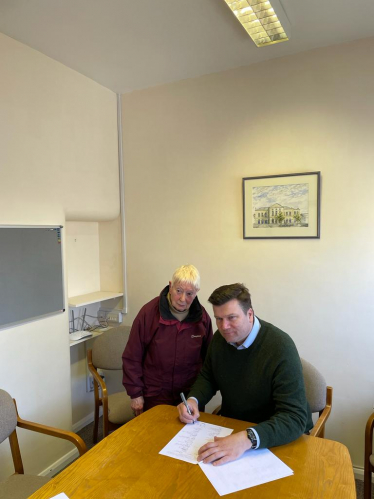 James Heappey signing the HSBC bank branch petition